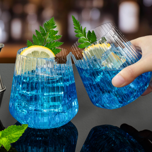 Vertical fluted disposable tumblers showing non-slip texture design for better grip